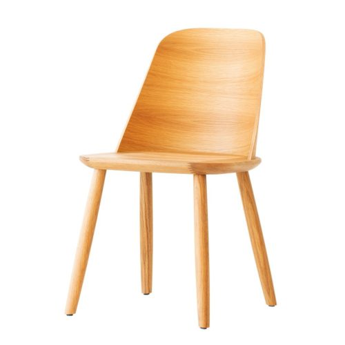 slightly angled view of dining chair with wooden seat